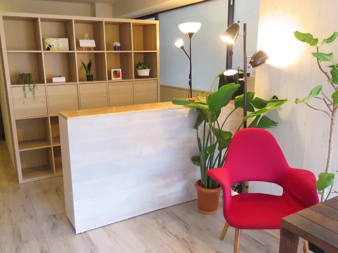 Interior of a relaxation salon with a bed and towels prepared in each private room